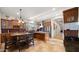 Open concept kitchen with an island and breakfast nook at 19711 W Georgia Ave, Litchfield Park, AZ 85340