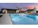 Expansive community pool area at sunset at 22693 E Happy Rd, Queen Creek, AZ 85142
