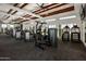 Large fitness center with modern equipment and high ceilings at 22693 E Happy Rd, Queen Creek, AZ 85142