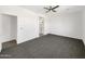 Bright bedroom with grey carpet and ample closet space at 22794 E Via Las Brisas --, Queen Creek, AZ 85142