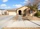 One-story home with a two-car garage and landscaped front yard at 22794 E Via Las Brisas --, Queen Creek, AZ 85142