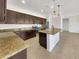 Modern kitchen with granite countertops and stainless steel appliances at 22794 E Via Las Brisas --, Queen Creek, AZ 85142