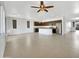 Modern kitchen with dark cabinetry and a large island at 22794 E Via Las Brisas --, Queen Creek, AZ 85142