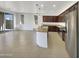 Open kitchen with island and stainless steel appliances at 22794 E Via Las Brisas --, Queen Creek, AZ 85142