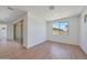 Comfortable bedroom featuring neutral carpet, recessed lighting, and bright windows at 23048 E Watford Dr, Queen Creek, AZ 85142