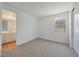 Bright bedroom showing a window and an en-suite bath at 23048 E Watford Dr, Queen Creek, AZ 85142