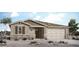 One-story home with brown and beige exterior, stone accents, and a two-car garage at 23048 E Watford Dr, Queen Creek, AZ 85142