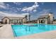 Community pool with a large deck area at 23048 E Watford Dr, Queen Creek, AZ 85142