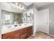 Bathroom with double sinks, shower, and separate tub at 2315 S 173Rd Dr, Goodyear, AZ 85338