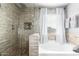 Bathroom featuring a walk-in shower and soaking tub at 2315 S 173Rd Dr, Goodyear, AZ 85338