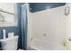 Bathroom with shower/tub combo and window at 2315 S 173Rd Dr, Goodyear, AZ 85338
