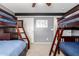 Bedroom with two bunk beds and a ceiling fan at 2315 S 173Rd Dr, Goodyear, AZ 85338