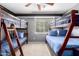 Bedroom with a built-in bunk bed at 2315 S 173Rd Dr, Goodyear, AZ 85338