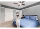 Bedroom with a queen bed and view into game room at 2315 S 173Rd Dr, Goodyear, AZ 85338