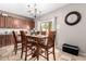 Kitchen dining area with a wood table and chairs at 2315 S 173Rd Dr, Goodyear, AZ 85338