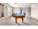 Game room features a pool table and ample space for entertainment at 2315 S 173Rd Dr, Goodyear, AZ 85338