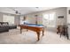 Game room with a pool table and seating at 2315 S 173Rd Dr, Goodyear, AZ 85338