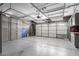 Garage with overhead storage and ping pong table at 2315 S 173Rd Dr, Goodyear, AZ 85338