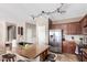 Island kitchen with stainless steel appliances at 2315 S 173Rd Dr, Goodyear, AZ 85338