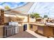 Stainless steel grill and outdoor kitchen with ample counter space at 2315 S 173Rd Dr, Goodyear, AZ 85338