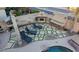 Outdoor kitchen and fireplace with seating area at 2315 S 173Rd Dr, Goodyear, AZ 85338