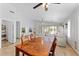 Bright dining area with wooden table and chairs, view to backyard at 23236 N 32Nd Dr, Phoenix, AZ 85027