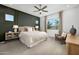 Spacious bedroom with neutral color palette and plenty of natural light at 24241 W Agora Ln, Buckeye, AZ 85326