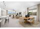 Open concept living and dining area with large island and modern decor at 24241 W Agora Ln, Buckeye, AZ 85326