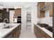 Modern kitchen with stainless steel appliances and ample cabinetry at 24241 W Agora Ln, Buckeye, AZ 85326