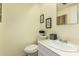 Simple and clean bathroom with a single sink and toilet at 2548 W Monte Cristo Ave, Phoenix, AZ 85023