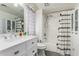Clean bathroom with updated vanity and bathtub at 2548 W Monte Cristo Ave, Phoenix, AZ 85023