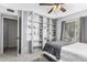 Bedroom with built-in shelving and ample closet space at 2548 W Monte Cristo Ave, Phoenix, AZ 85023
