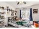 Fun bedroom with superhero theme and plenty of storage at 2548 W Monte Cristo Ave, Phoenix, AZ 85023