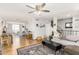Spacious living area with wood floors and comfortable seating at 2548 W Monte Cristo Ave, Phoenix, AZ 85023