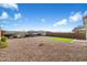 Landscaped backyard with artificial turf and gravel at 31957 N 125Th Ave, Peoria, AZ 85383