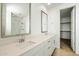 Modern bathroom boasts double vanity and a walk-in shower at 31957 N 125Th Ave, Peoria, AZ 85383