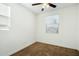 Charming bedroom with window and ceiling fan at 31957 N 125Th Ave, Peoria, AZ 85383