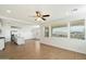 Bright living room with tile floors and ceiling fan at 31957 N 125Th Ave, Peoria, AZ 85383