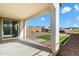 Covered patio with sliding glass doors leading to backyard at 31957 N 125Th Ave, Peoria, AZ 85383