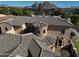 Housetop view shows a unique architectural design with a stone turret at 3804 E Camelback Rd, Phoenix, AZ 85018