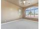 Spacious bedroom with large window and window shutters at 3804 E Camelback Rd, Phoenix, AZ 85018