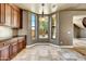 Kitchen breakfast nook with built-in cabinetry and large window at 3804 E Camelback Rd, Phoenix, AZ 85018