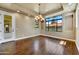 Bright dining room with hardwood floors and chandelier at 3804 E Camelback Rd, Phoenix, AZ 85018