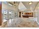 Open living space with kitchen view and access to the backyard at 3804 E Camelback Rd, Phoenix, AZ 85018