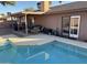 Private backyard with a sparkling pool and covered patio at 3910 E Corrine Dr, Phoenix, AZ 85032