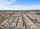 Wide aerial view of a community featuring many houses and streets at 4096 E Alamosa Pl, Chandler, AZ 85249