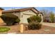Charming single-Gathering home features desert landscaping, a two-car garage, and a welcoming facade at 42374 W Avella Dr, Maricopa, AZ 85138