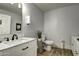 Clean and modern bathroom with a marble vanity and updated fixtures at 531 E Lynwood St, Phoenix, AZ 85004