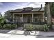 House with a classic design, gated entry, and desert landscaping at 531 E Lynwood St, Phoenix, AZ 85004