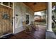 Inviting front porch with rocking chairs and a wooden door at 531 E Lynwood St, Phoenix, AZ 85004